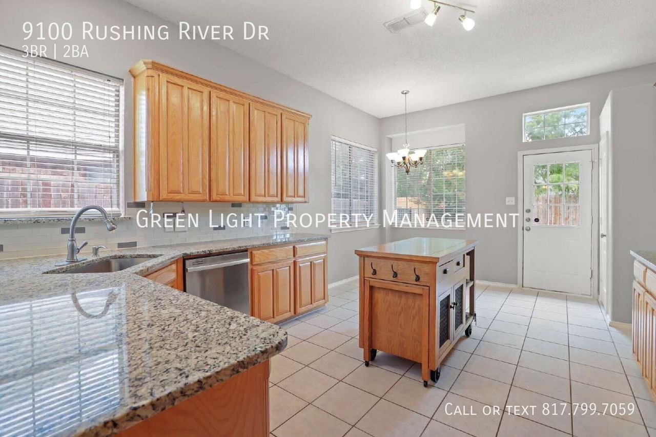 9100 Rushing River Dr - Photo 7 of 32