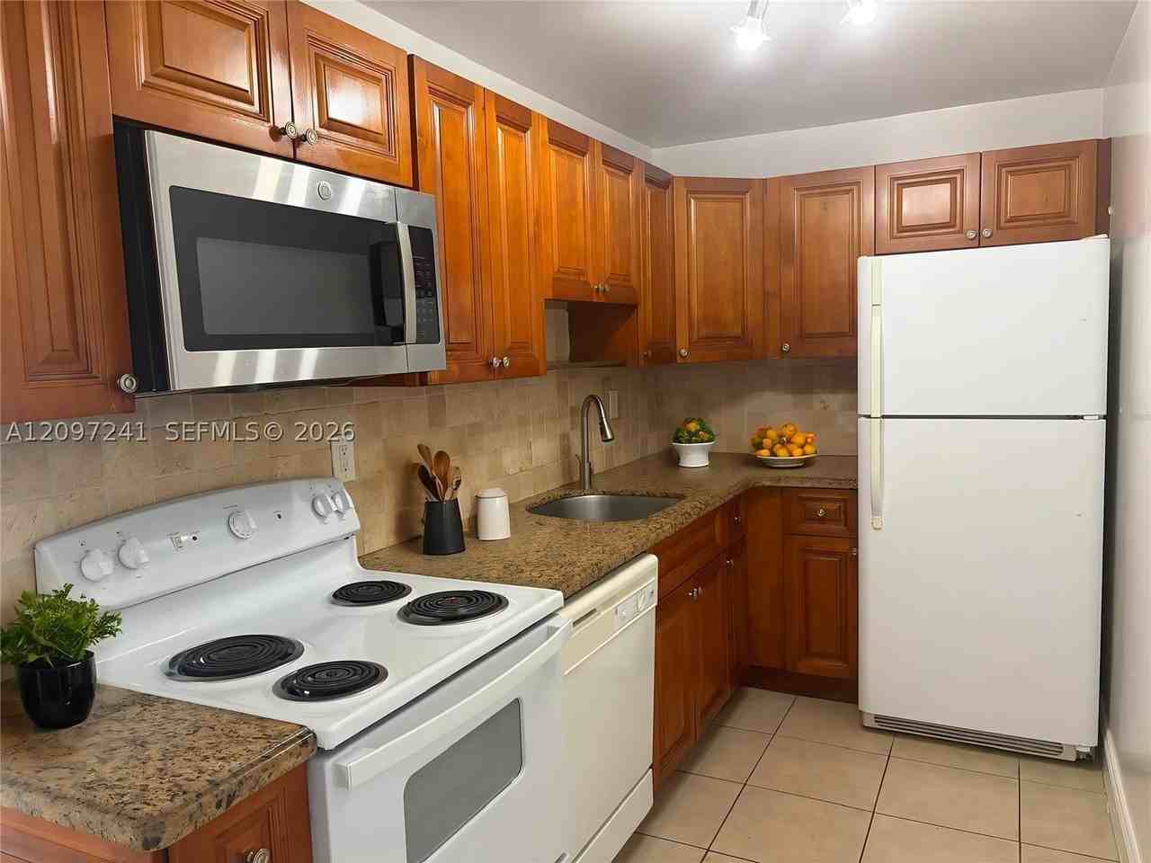 8788 Sw 12th St #103 - Photo 3 of 9