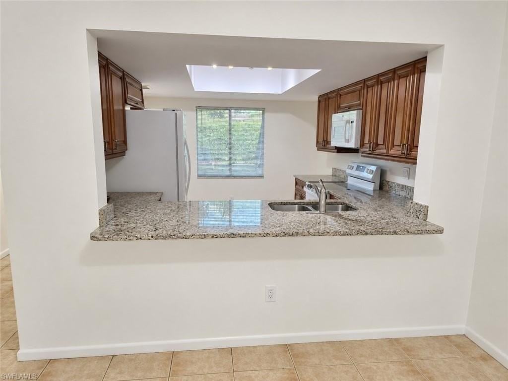 5697 Rattlesnake Hammock Rd #101C - Photo 4 of 25