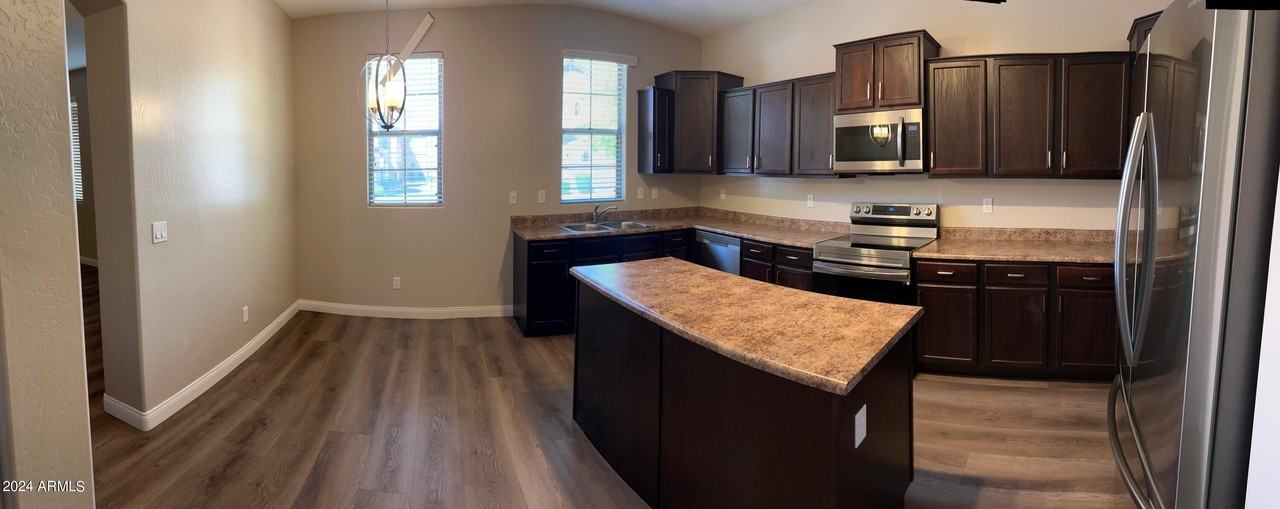 7165 S 48th Gln - Photo 3 of 17