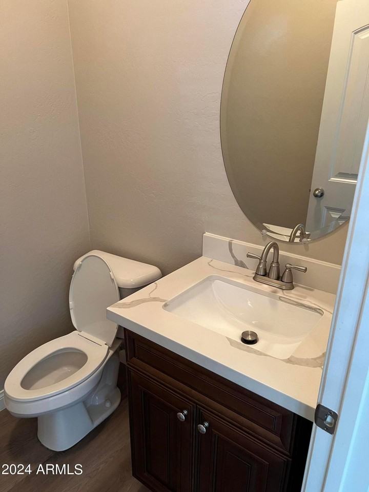 7165 S 48th Gln - Photo 4 of 17