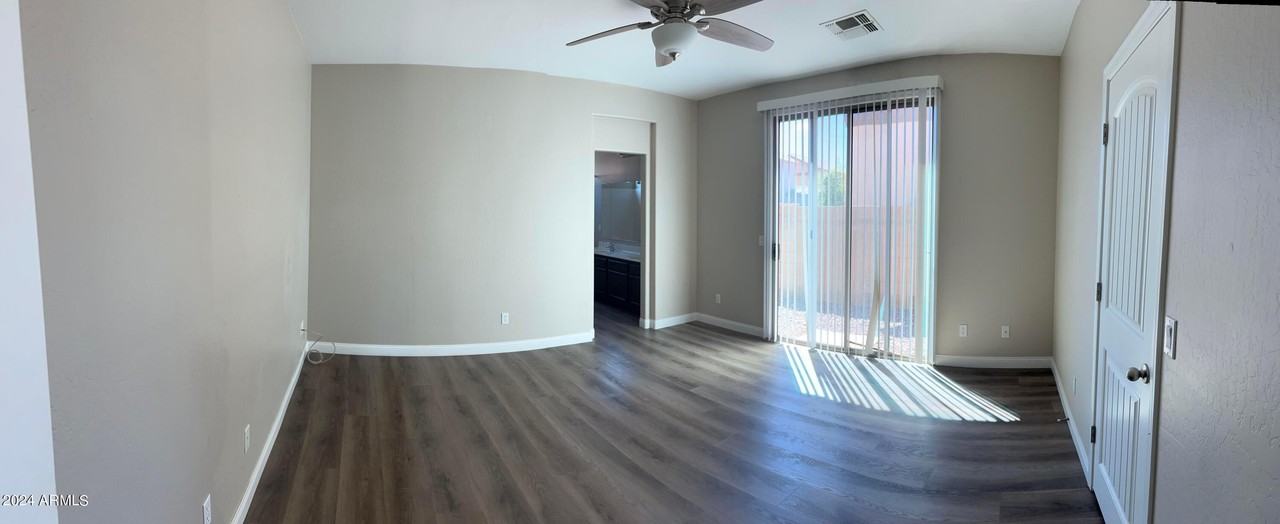 7165 S 48th Gln - Photo 5 of 17