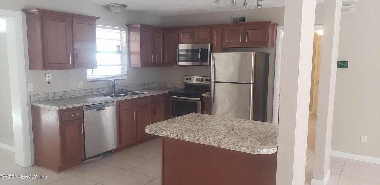 8015 Patou Dr N - Photo 4 of 15