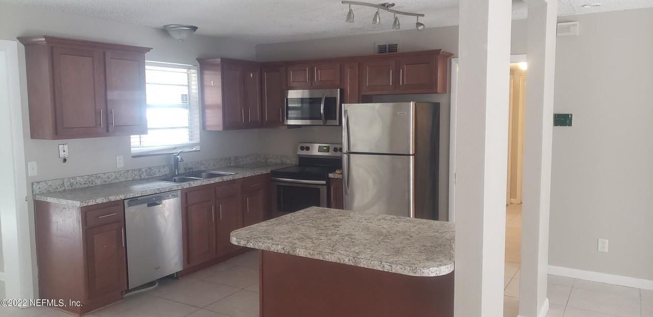 8015 Patou Dr N - Photo 7 of 15