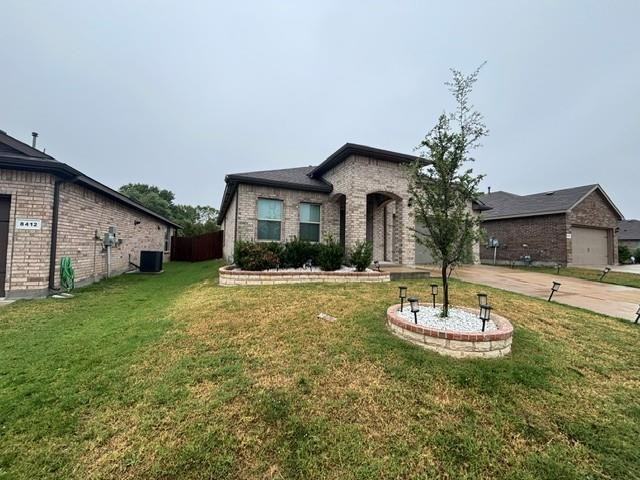 8408 Wildwest Dr - Photo 3 of 4