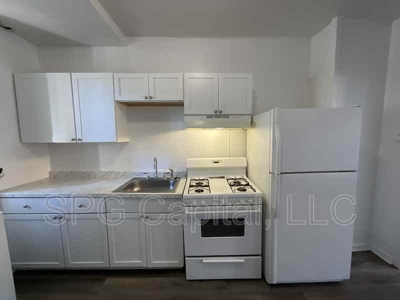 313 S Penn St - Photo 4 of 10
