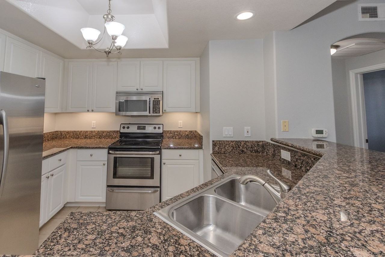 9293 Regents Rd #C108 - Photo 5 of 45