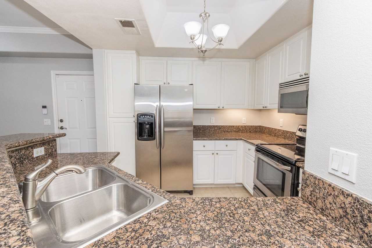 9293 Regents Rd #C108 - Photo 7 of 45