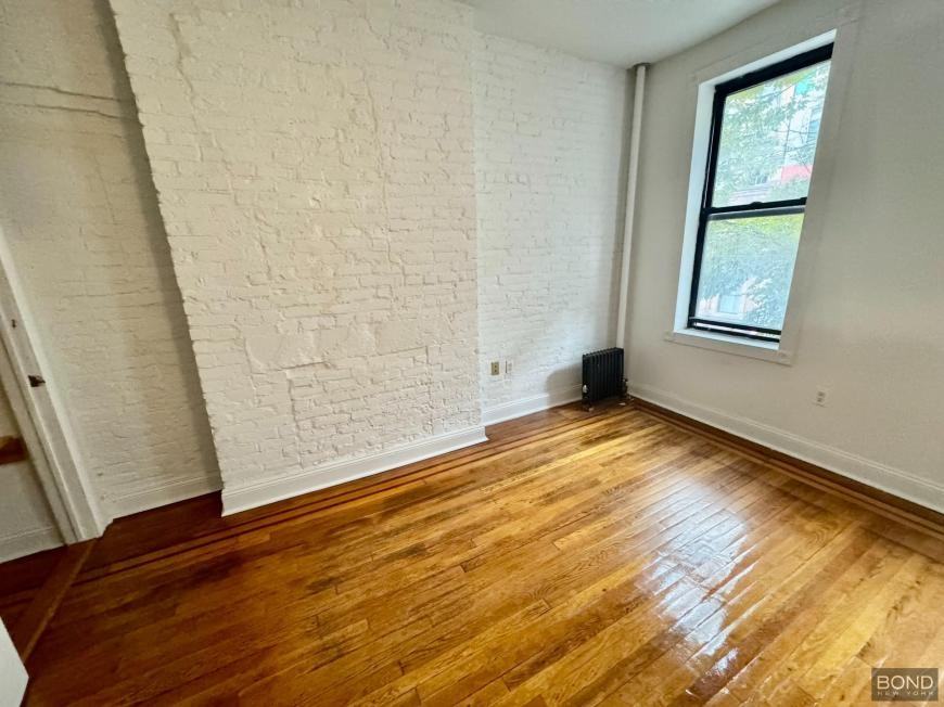 357 W 53rd St - Photo 2 of 6