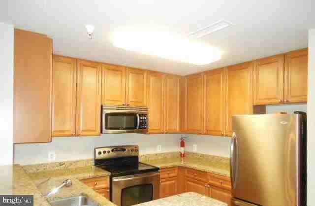 11700 Old Georgetown Rd #207 - Photo 2 of 9