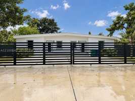 featured image of 1066 Nw 100th Ter #1