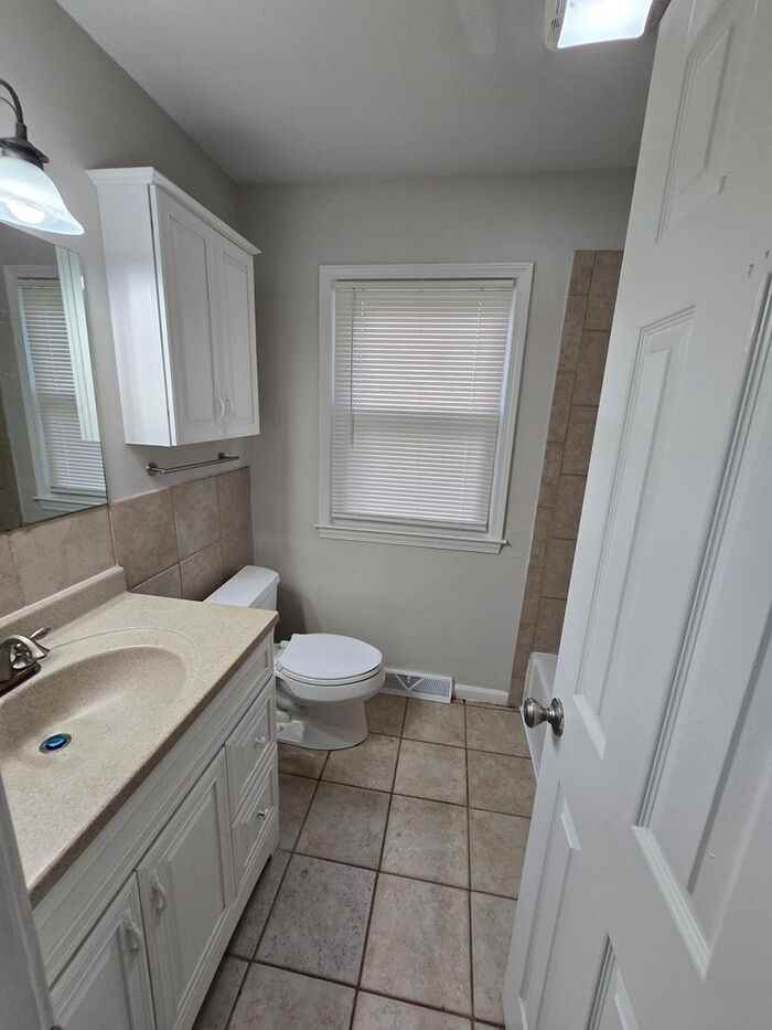 8218 E 133rd Ter - Photo 5 of 15