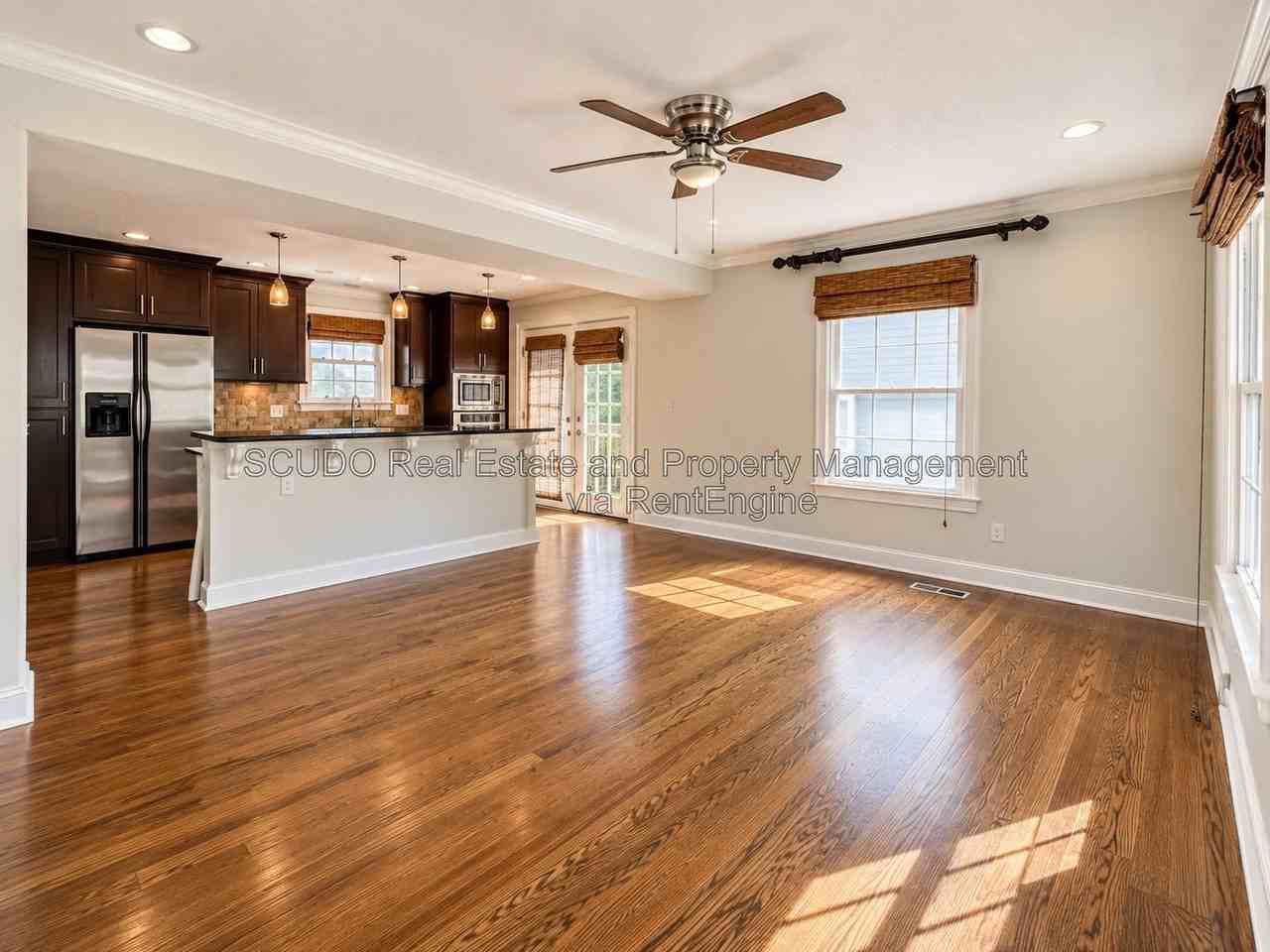 418 E 63rd Ter - Photo 2 of 19