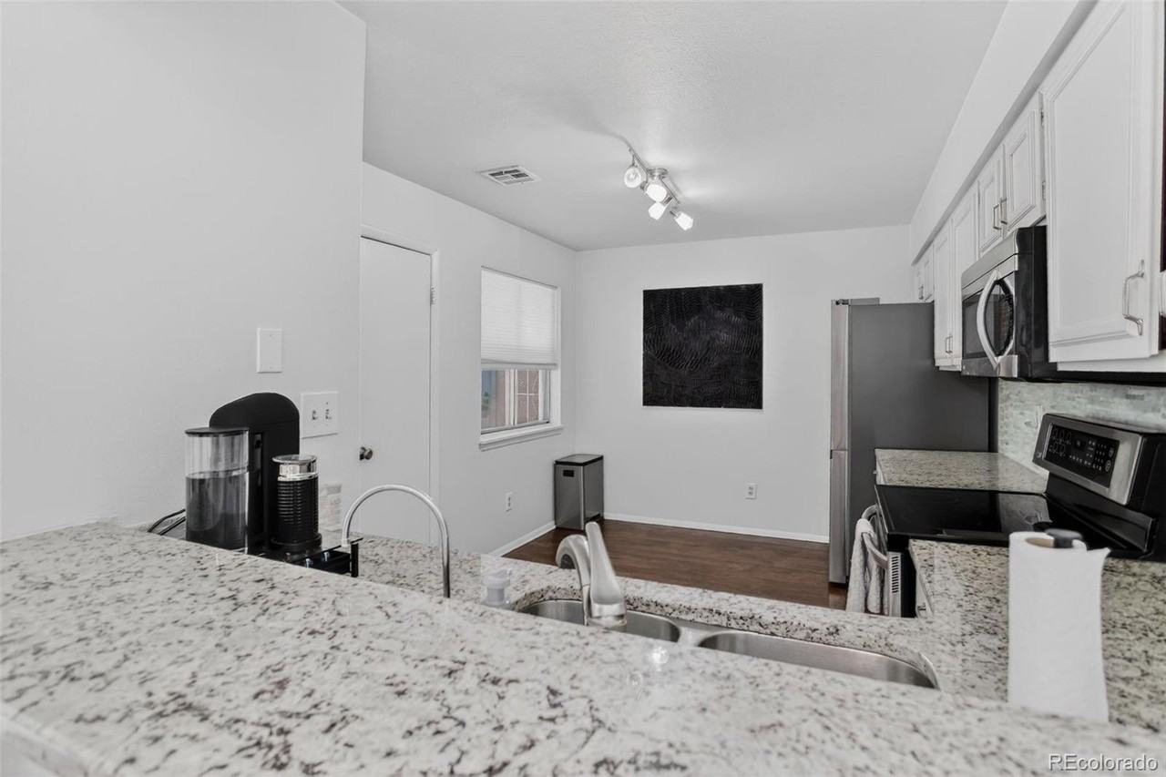7205 S Gaylord St #F15 - Photo 2 of 28