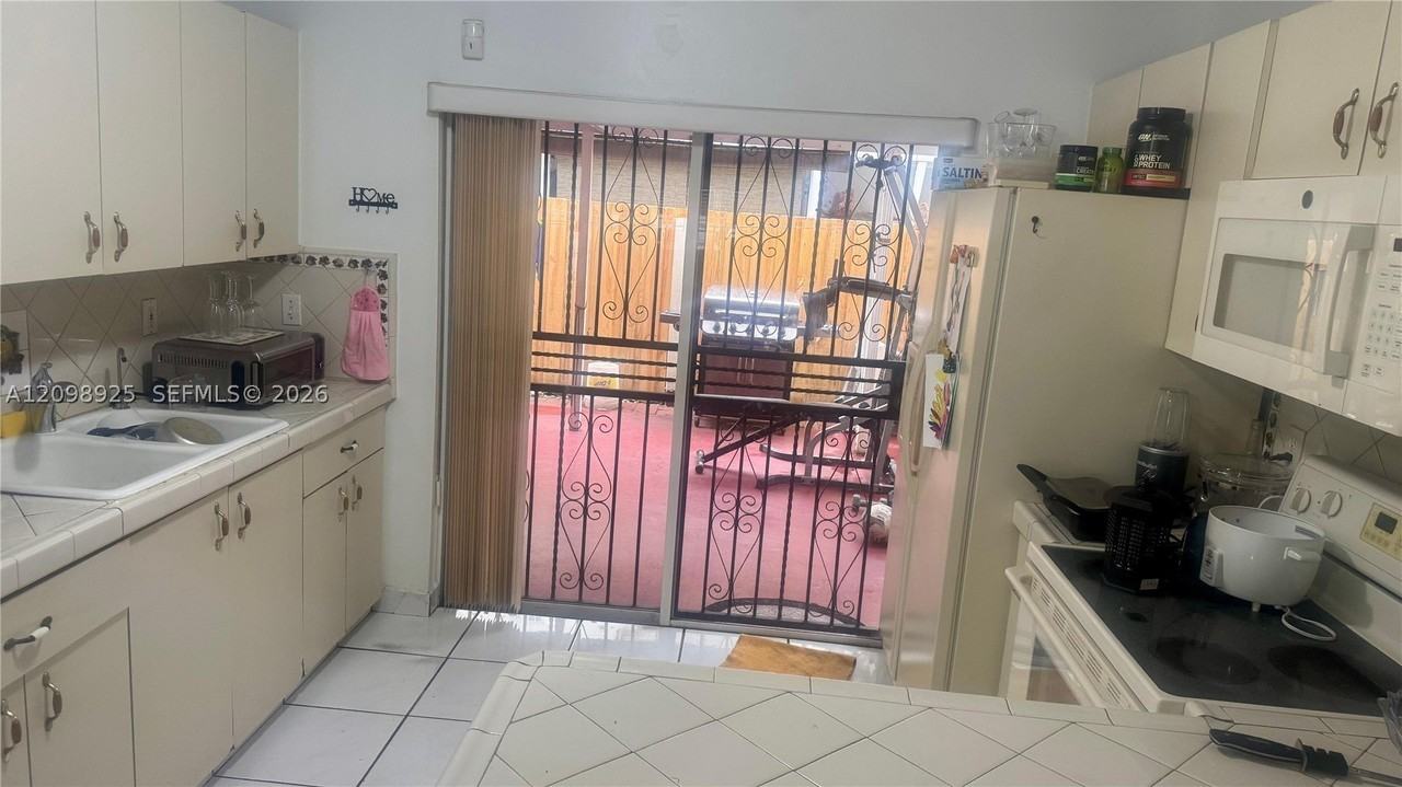 7808 W 29th Ln #102-27 - Photo 3 of 10
