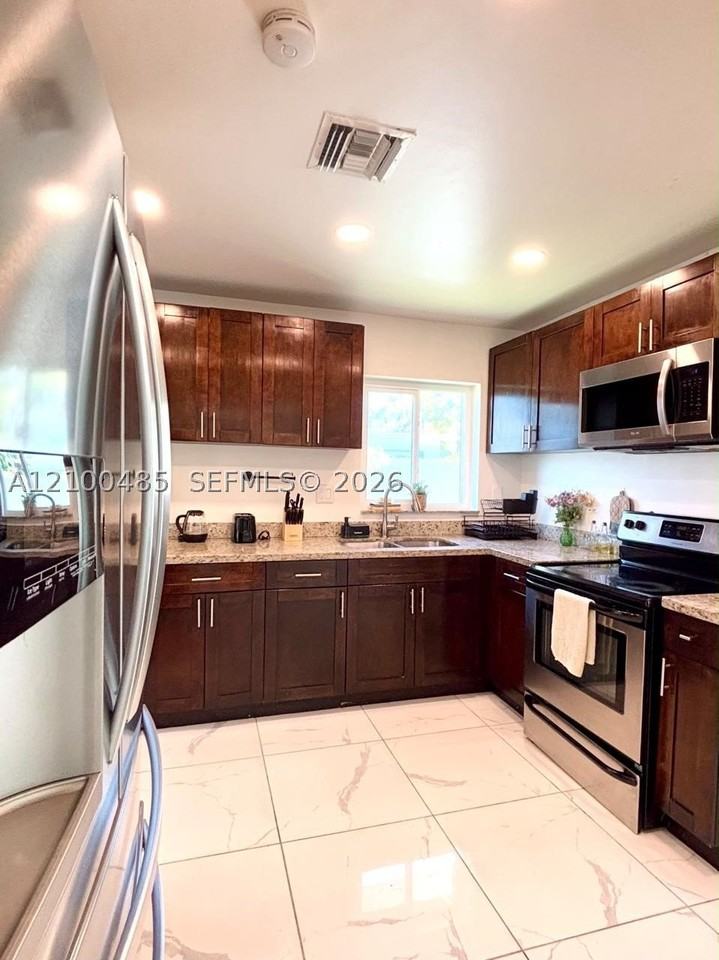 75 Nw 206th Ter - Photo 4 of 13