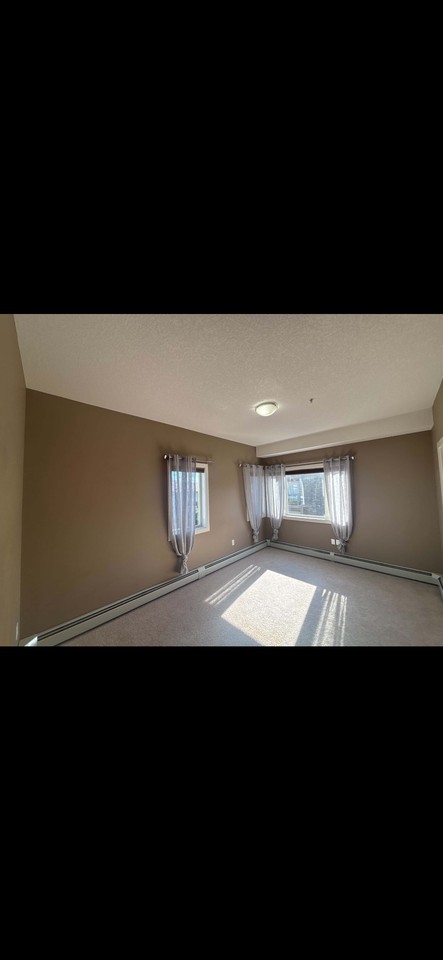 23 Millrise Drive Southwest #302 - Photo 7 of 12