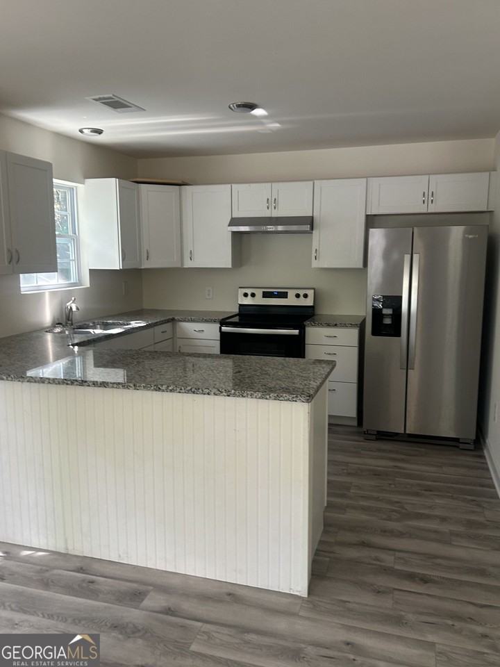 7040 Hassana Ln - Photo 6 of 23