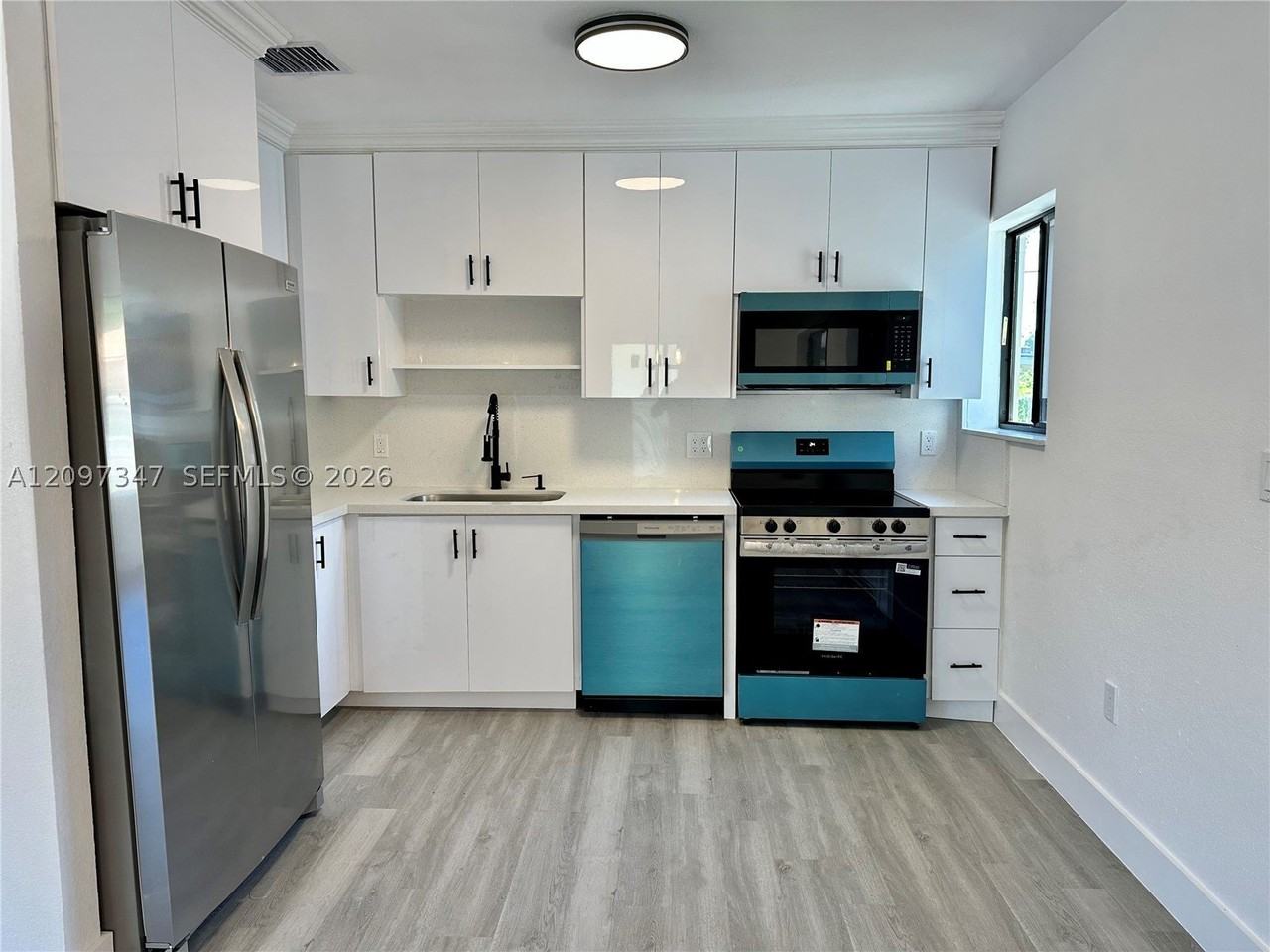 1150 Nw 116th Ter - Photo 5 of 28