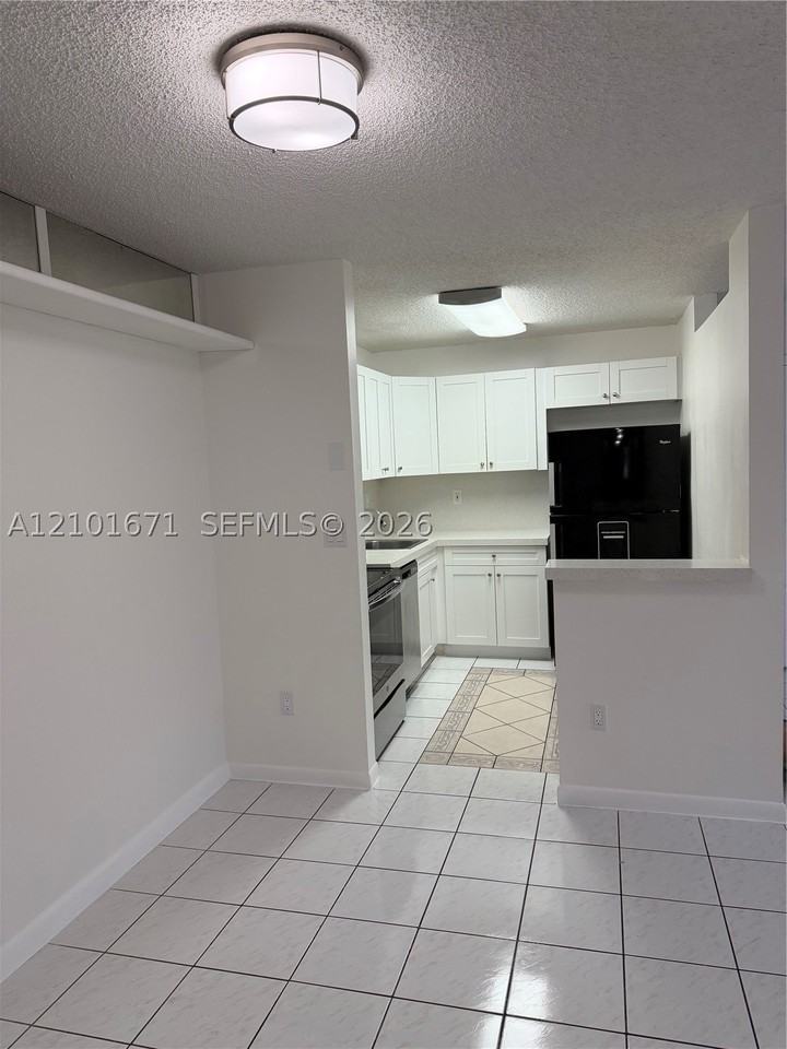 4690 Nw 102nd Ave #103-24 - Photo 2 of 10