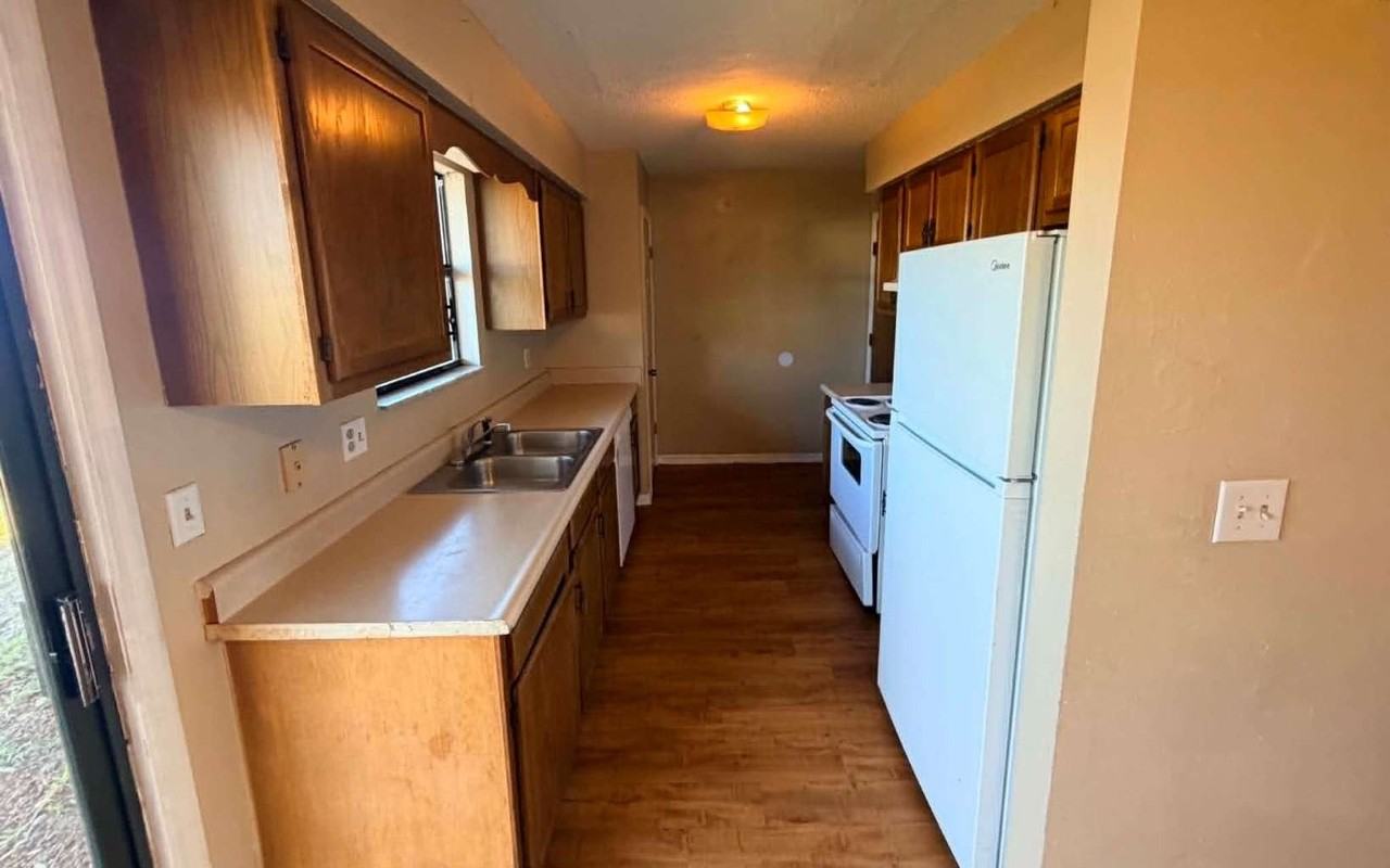 3811 NW ARCHER 101 - Photo 4 of 7