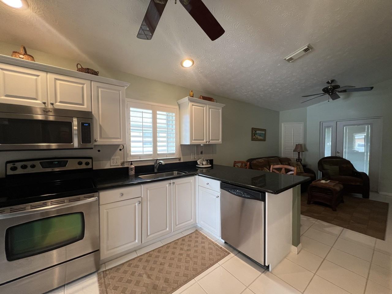 6025 Adonidia Pl - Photo 3 of 13