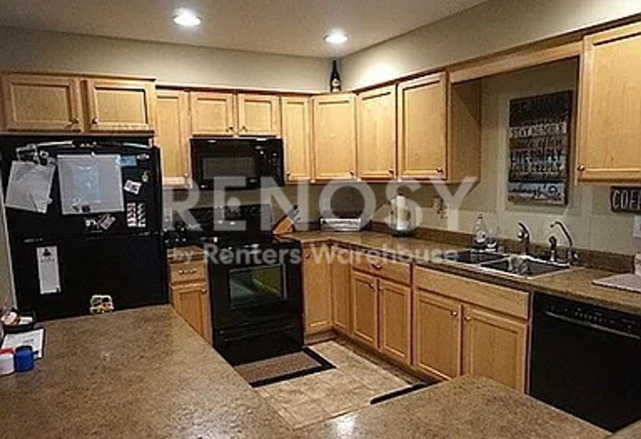 7916 Beard Ave N - Photo 3 of 13