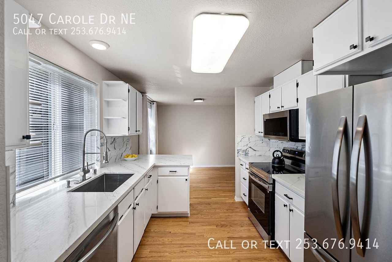 5047 Carole Dr Ne - Photo 2 of 31
