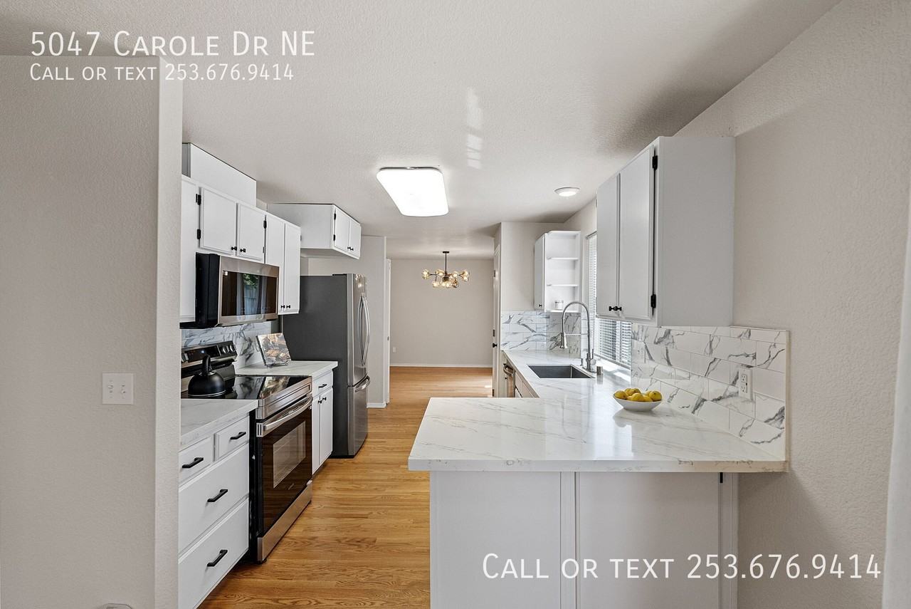 5047 Carole Dr Ne - Photo 3 of 31