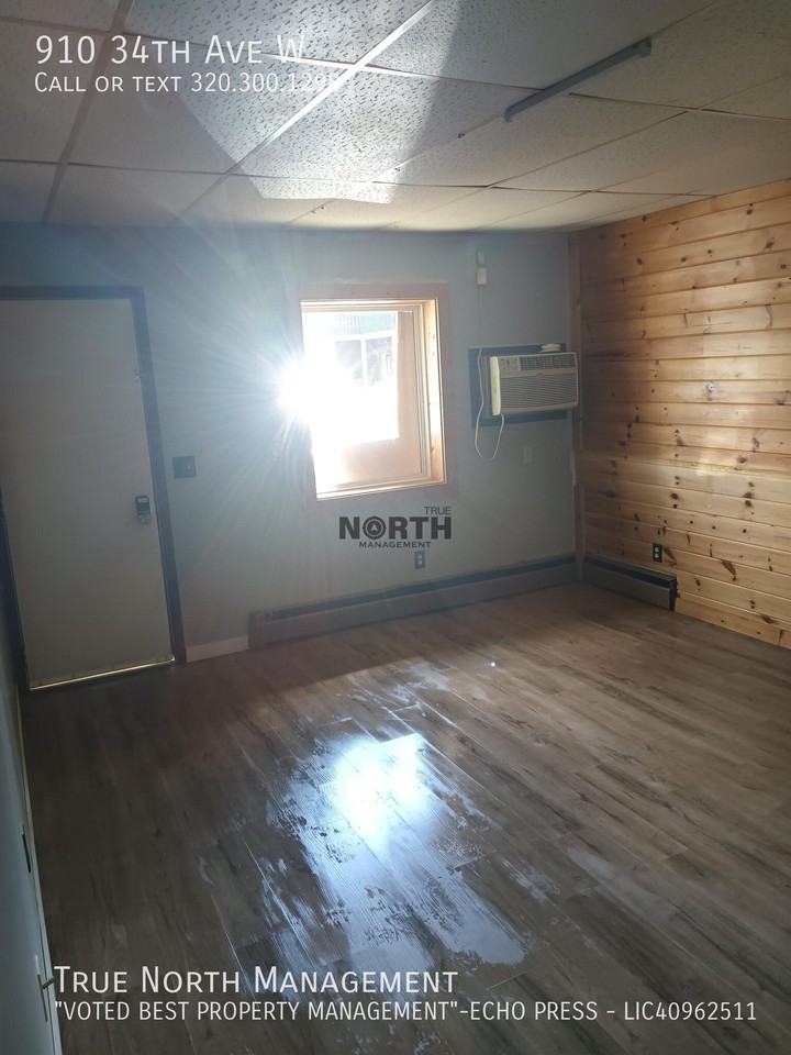 910 34th Ave W - Photo 3 of 4