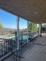 featured image of 6363 Woodman Dr