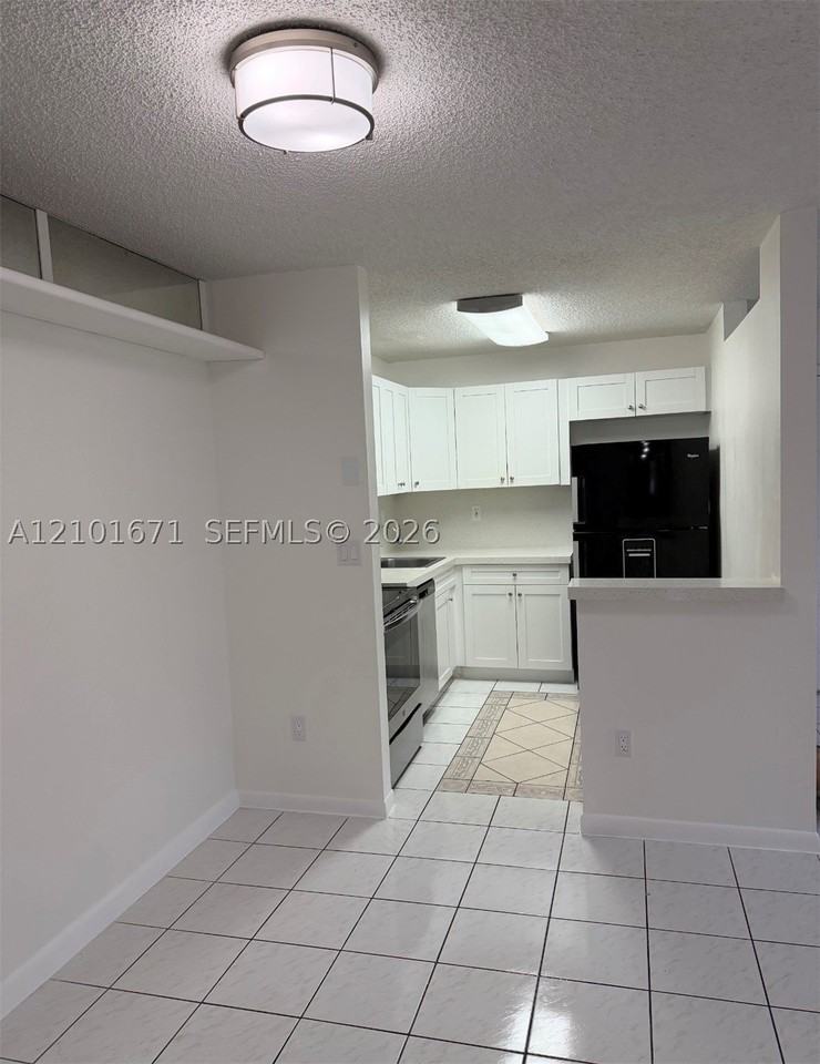 4690 Nw 102nd Ave #103-24 - Photo 3 of 10