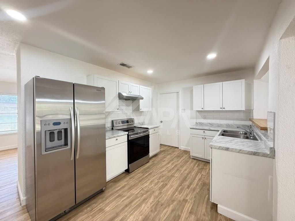 7419 Buckboard Ln - Photo 5 of 20