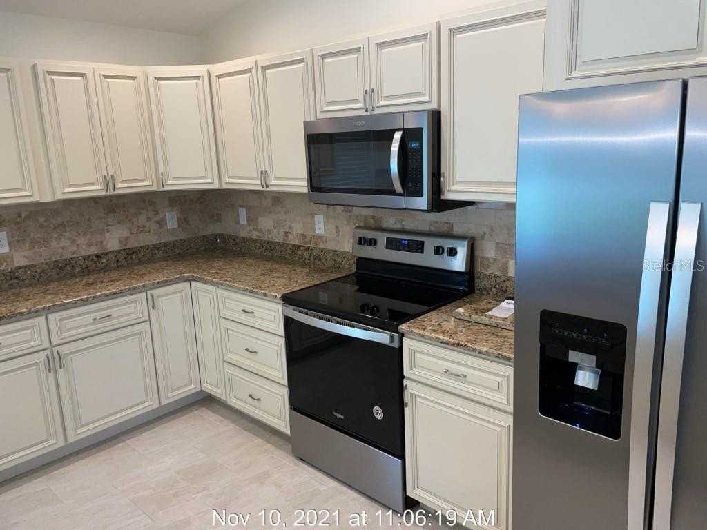 5999 Rhapsody Ave - Photo 5 of 10