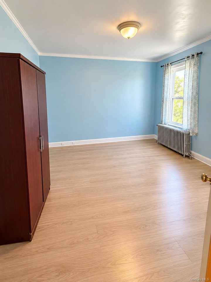 690 E 240th St - Photo 7 of 10