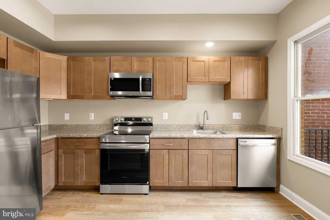 5230 Strathmore Ave - Photo 7 of 29