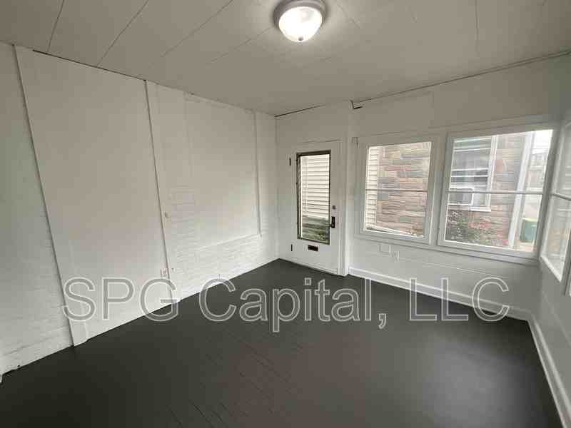 123 W 2nd St - Photo 2 of 10