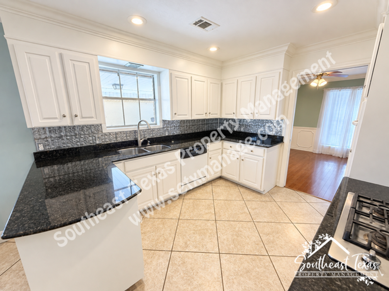 6030 Zenith St - Photo 6 of 28
