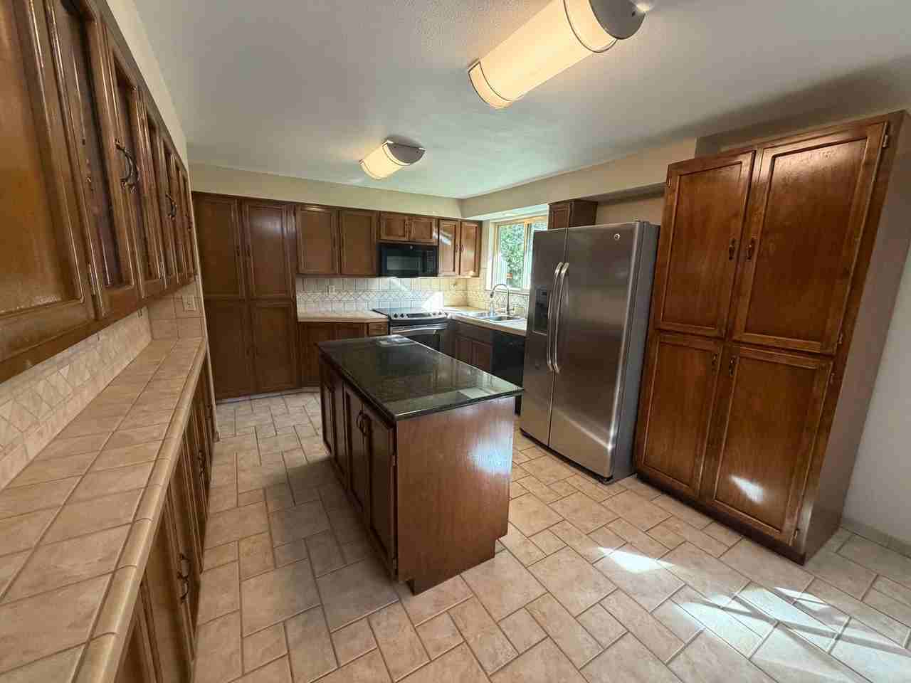 10906 E 27th Ave - Photo 4 of 21