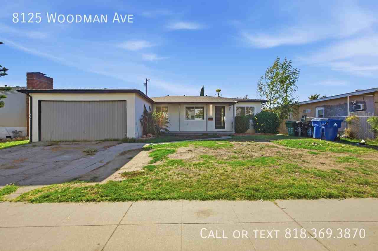 8125 Woodman Ave - Photo 3 of 27