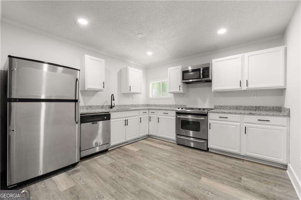 4755 Kent Rd - Photo 4 of 26