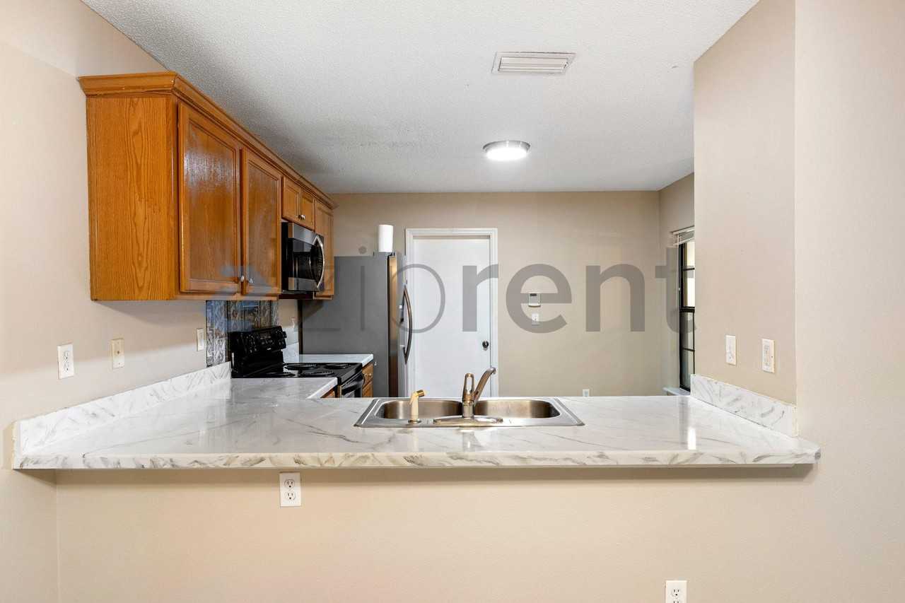 7705 Highchair Ln - Photo 4 of 24