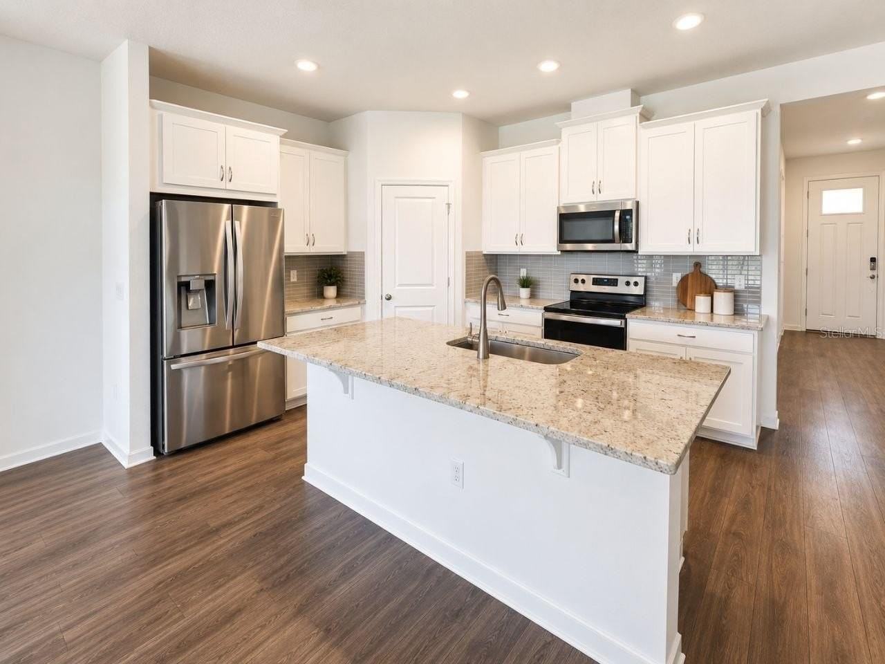 1141 Lakeshore Breeze Pl - Photo 4 of 18
