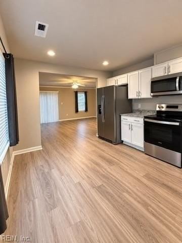 1102 Clarys Dr - Photo 5 of 15