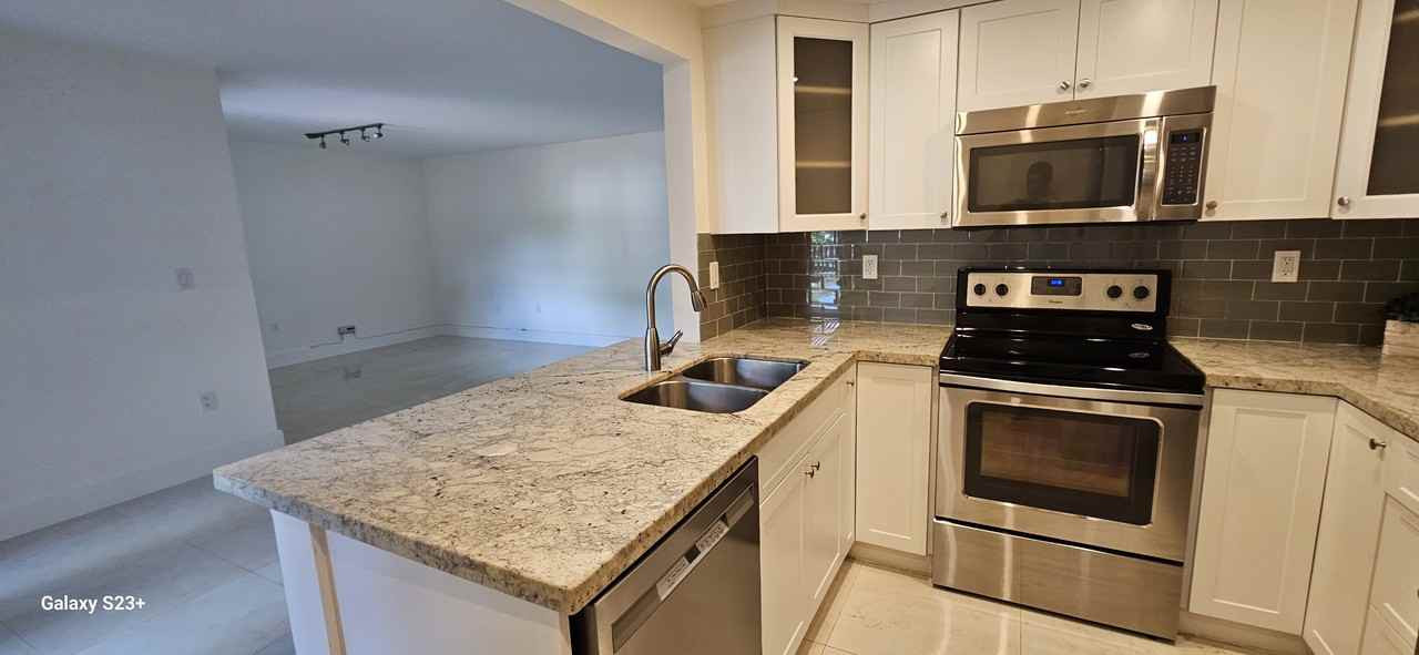 9950 Nw 9th Street Cir #104 - Photo 3 of 14