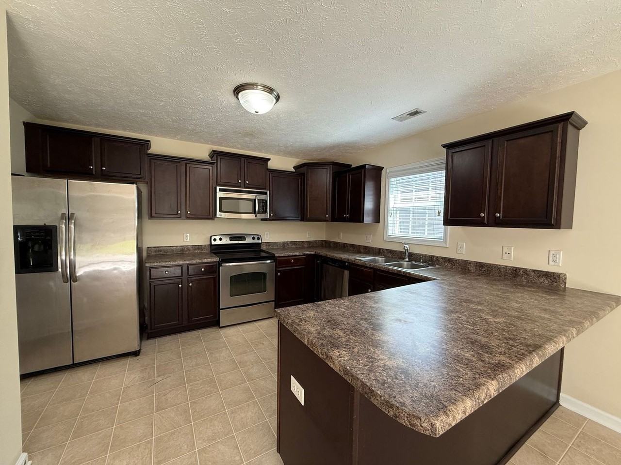 319 Hughes Ln - Photo 3 of 13