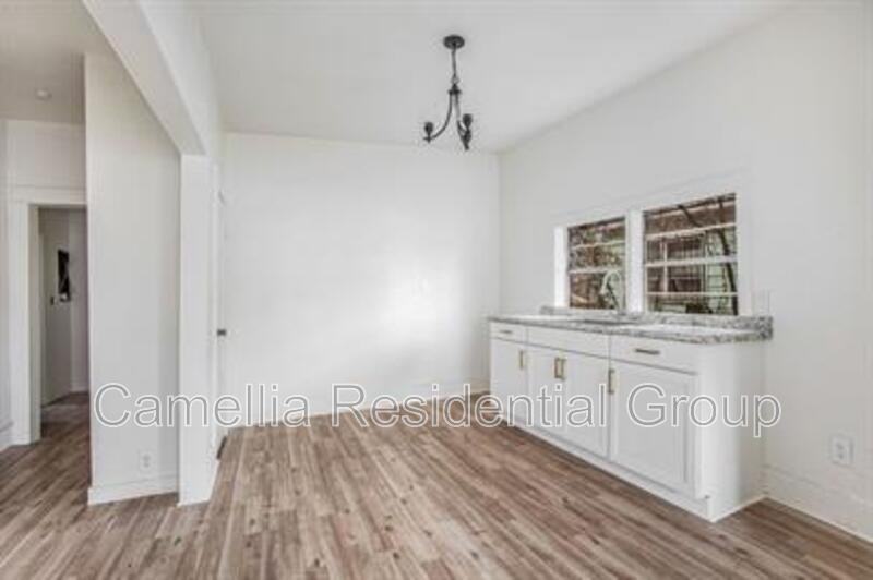 1321 2nd Ave W - Photo 3 of 8