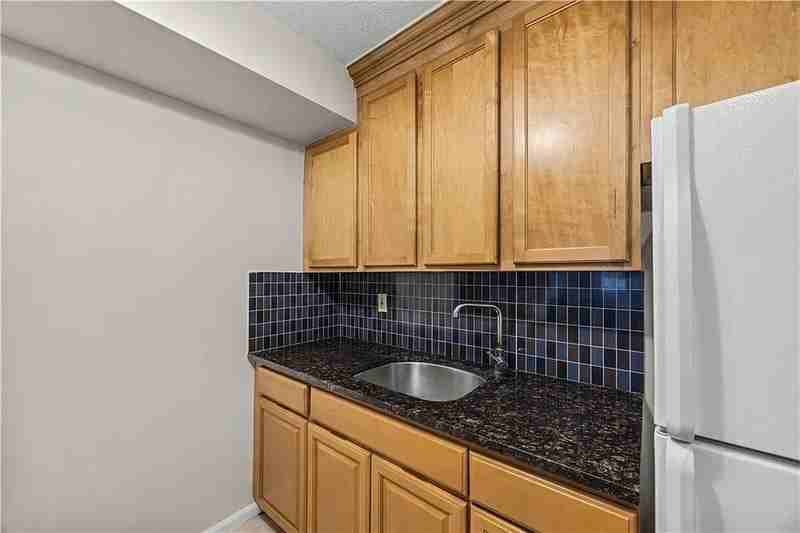 10842 Flatlands 9th St #25B - Photo 3 of 19