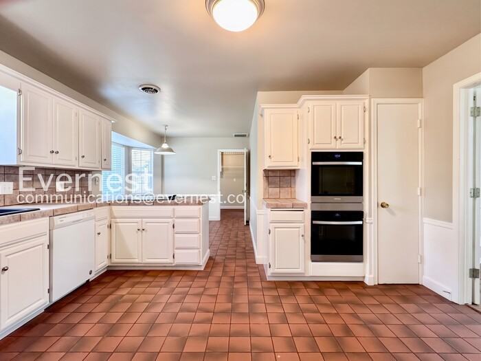 7716 E 53rd Pl - Photo 7 of 27