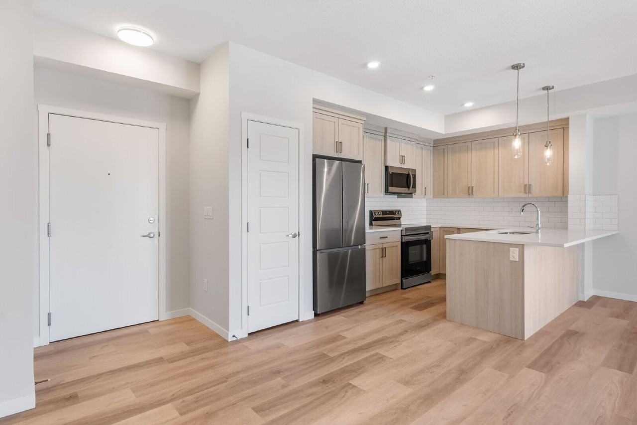 415, 360 Harvest Hills Way NE - Photo 2 of 29